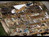 The fourth (and final) image featuring another heavily damaged building.